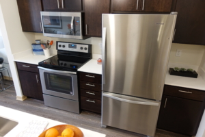 apartment with stainless steel appliances
